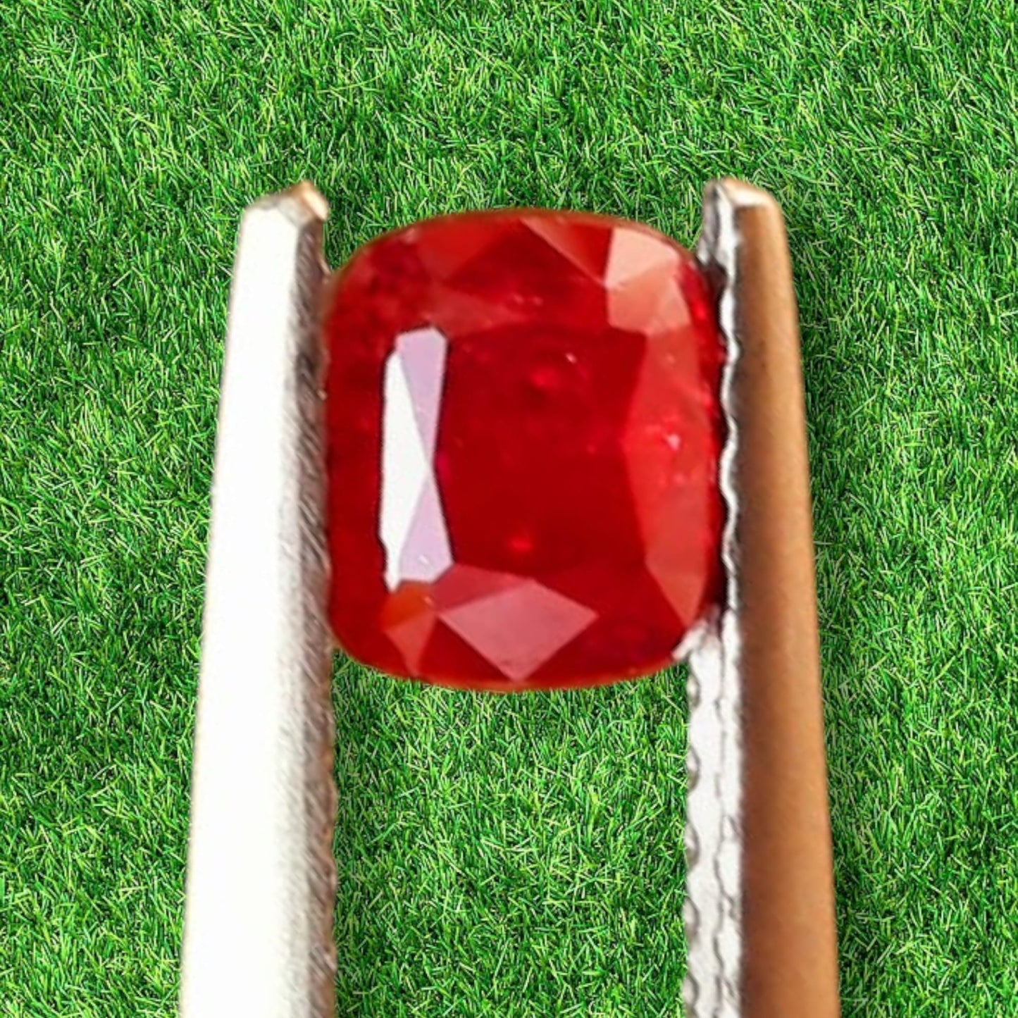 Loose natural unheated 0.77 ct. Kashmir red Ruby with inclusions.