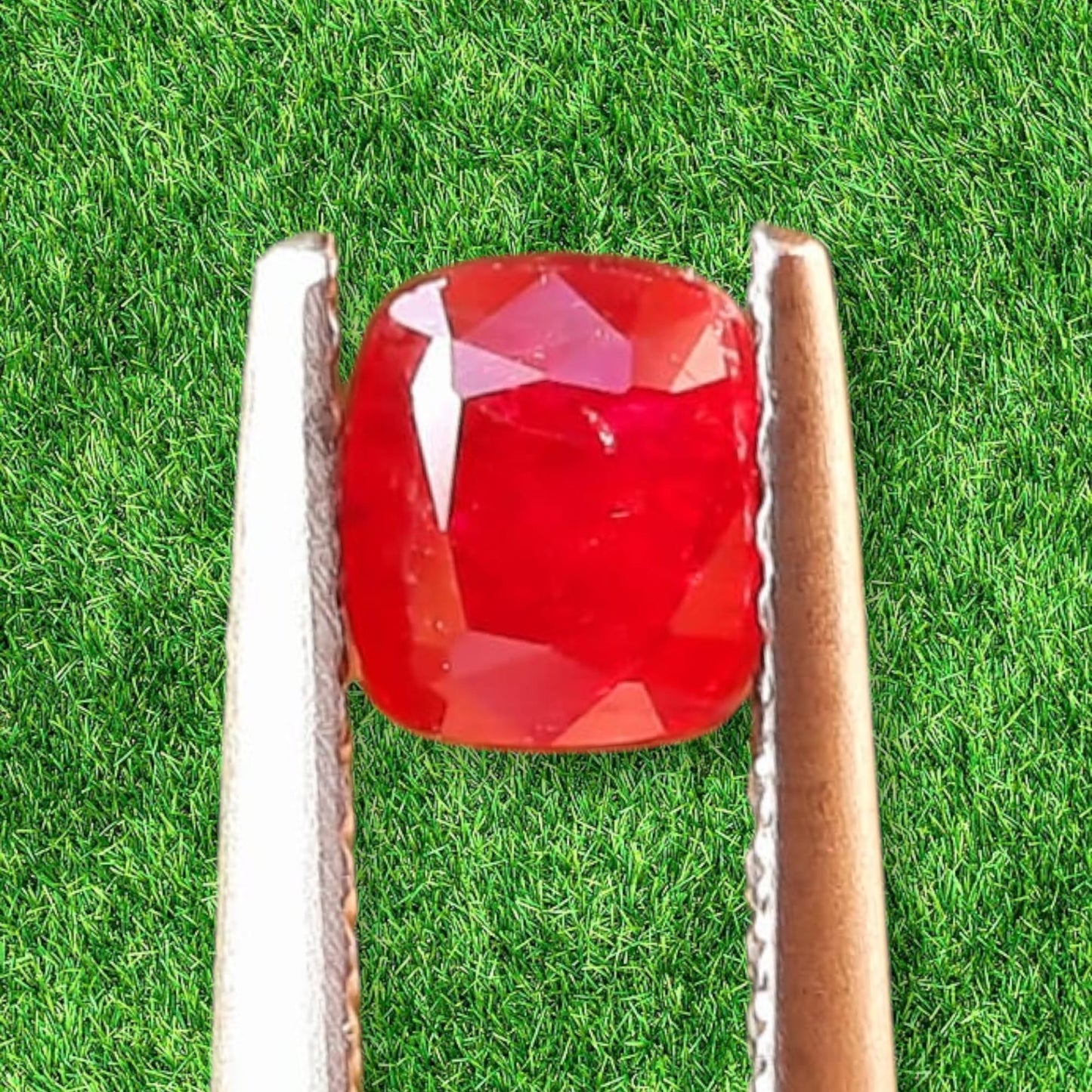 Loose natural unheated 0.77 ct. Kashmir red Ruby with inclusions.